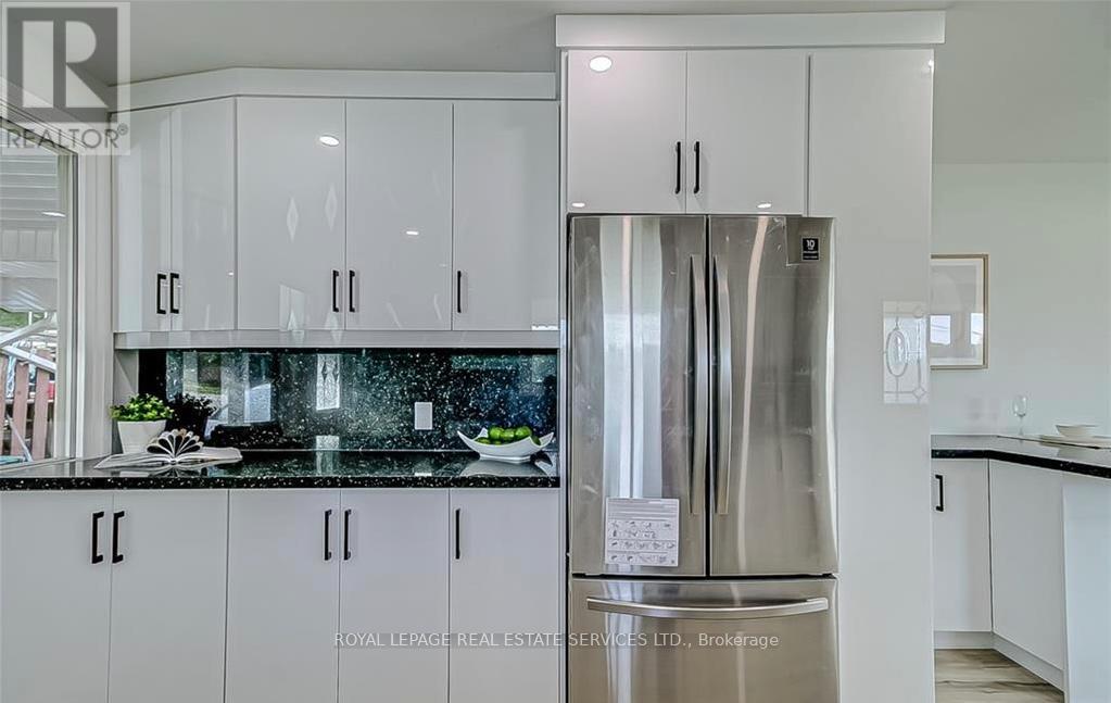 40 Ewing Street, Halton Hills, Ontario  L7G 2P9 - Photo 6 - W12576126