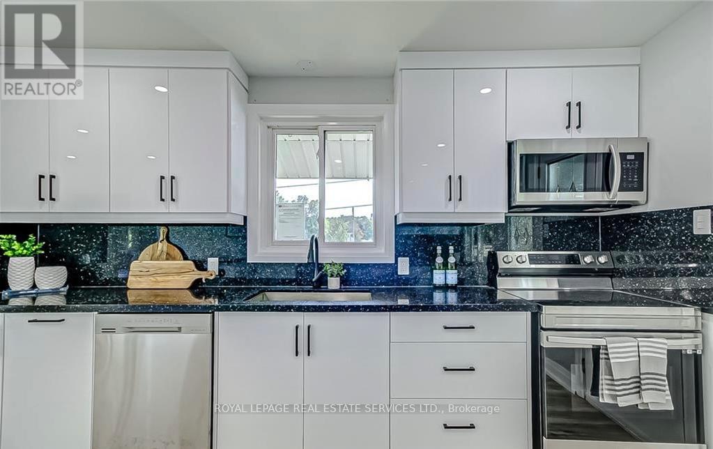 40 Ewing Street, Halton Hills, Ontario  L7G 2P9 - Photo 7 - W12576126