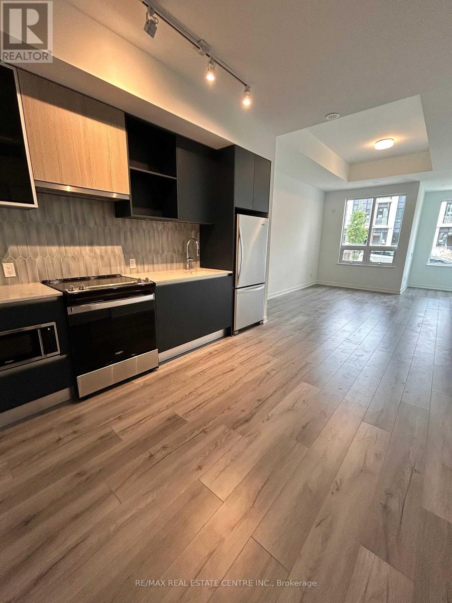 125 - 3020 Trailside Drive, Oakville, Ontario  L6M 4M2 - Photo 4 - W12577926