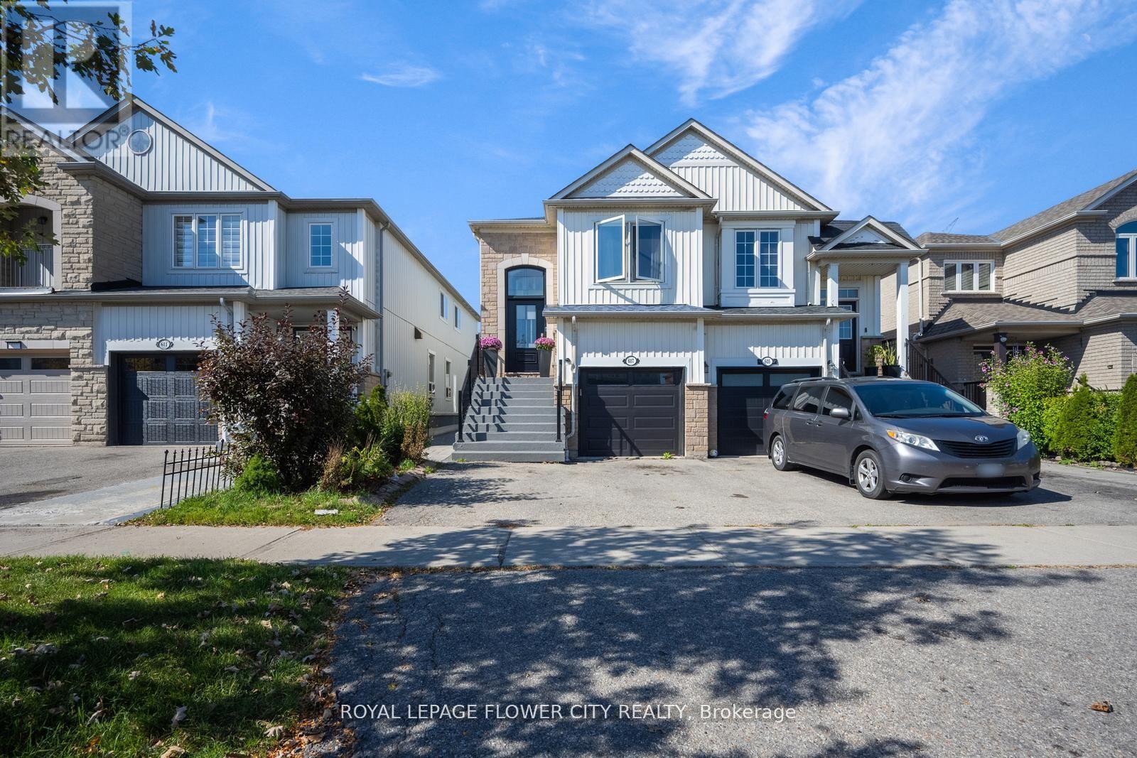 607 Rossellini Drive, Mississauga, Ontario  L5W 1M5 - Photo 1 - W12578014