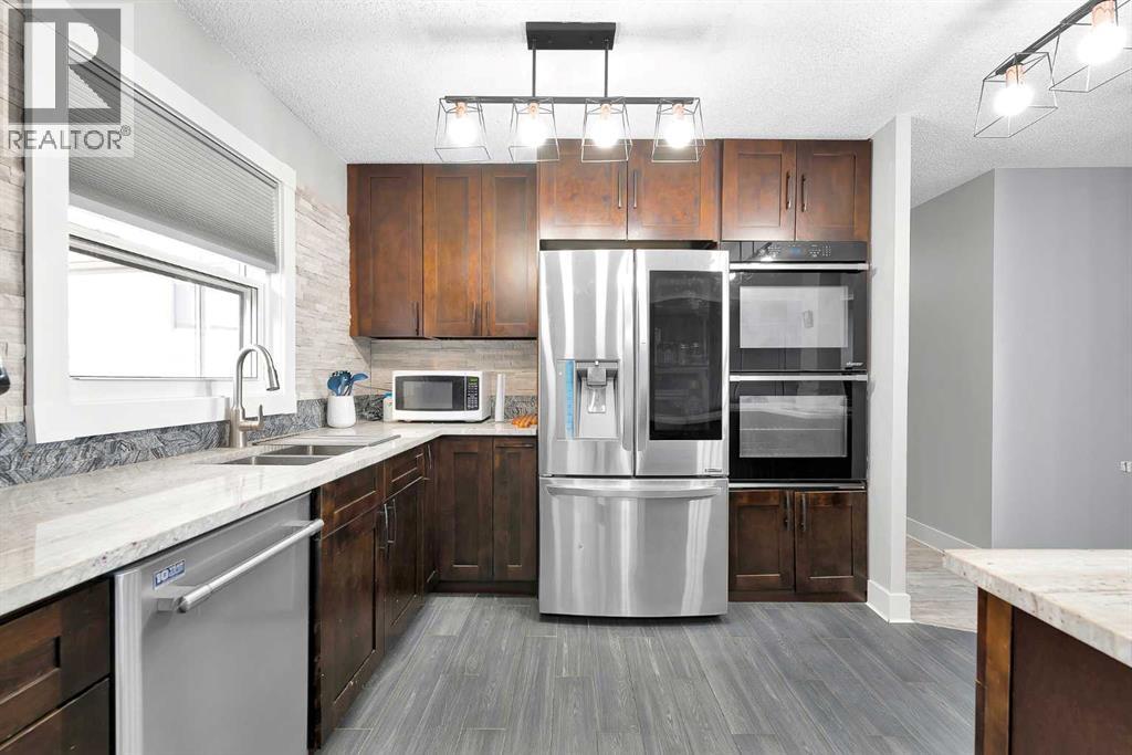 51 Huntstrom Road Ne, Calgary, Alberta  T2K 5W1 - Photo 9 - A2271584