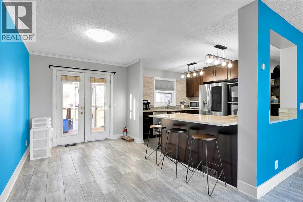 51 Huntstrom Road Ne, Calgary, Alberta  T2K 5W1 - Photo 7 - A2271584