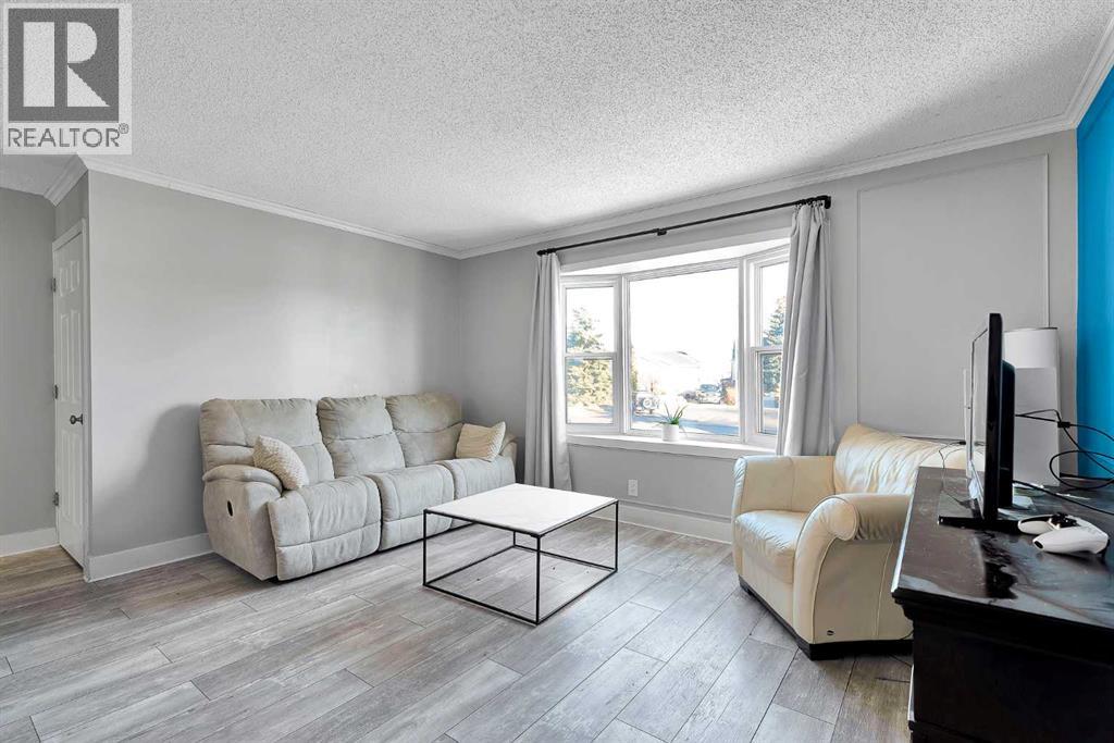 51 Huntstrom Road Ne, Calgary, Alberta  T2K 5W1 - Photo 5 - A2271584