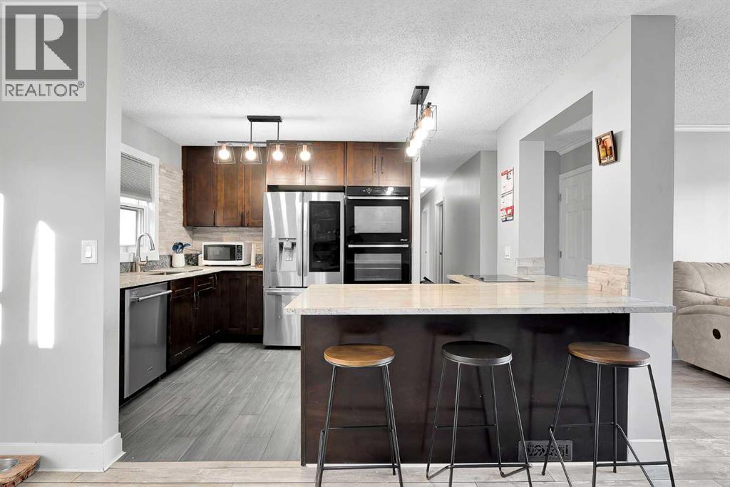 51 Huntstrom Road Ne, Calgary, Alberta  T2K 5W1 - Photo 8 - A2271584