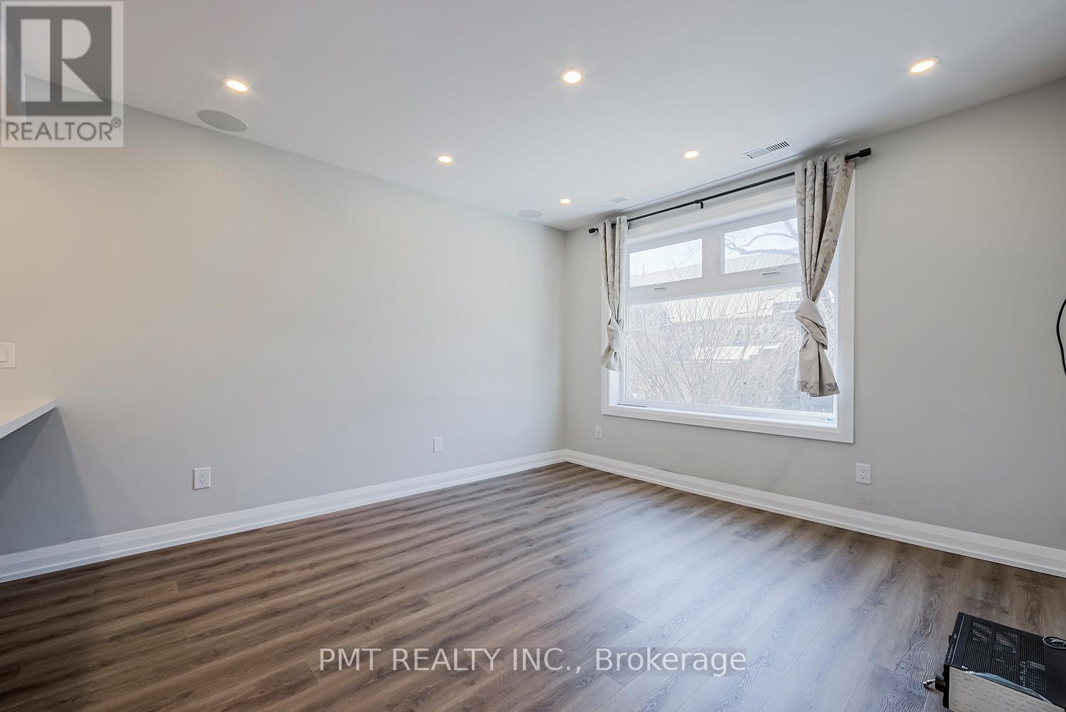 A - 17 Lockwood Road, Toronto, Ontario  M4L 3M7 - Photo 11 - E12578418