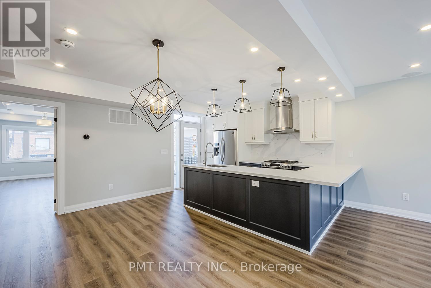 A - 17 Lockwood Road, Toronto, Ontario  M4L 3M7 - Photo 7 - E12578418