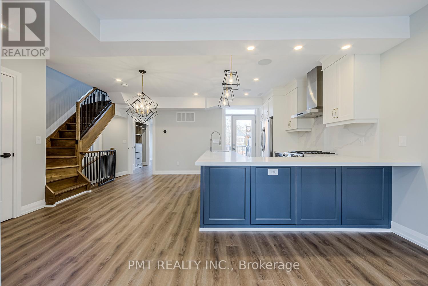 A - 17 Lockwood Road, Toronto, Ontario  M4L 3M7 - Photo 8 - E12578418