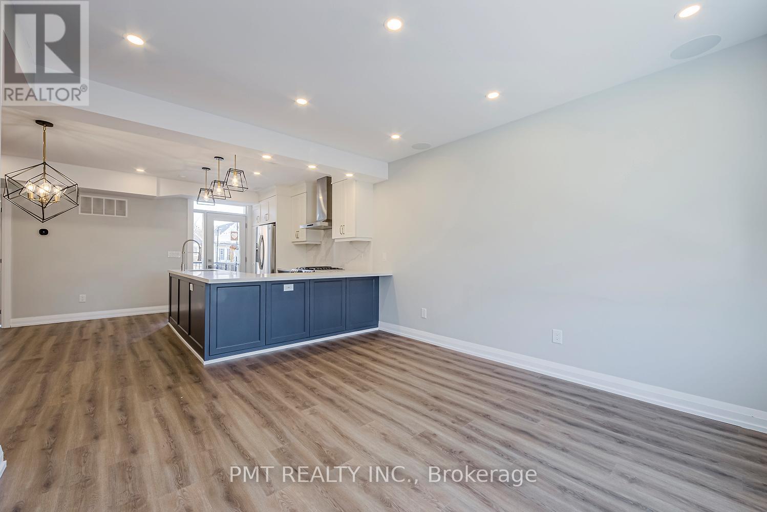 A - 17 Lockwood Road, Toronto, Ontario  M4L 3M7 - Photo 9 - E12578418