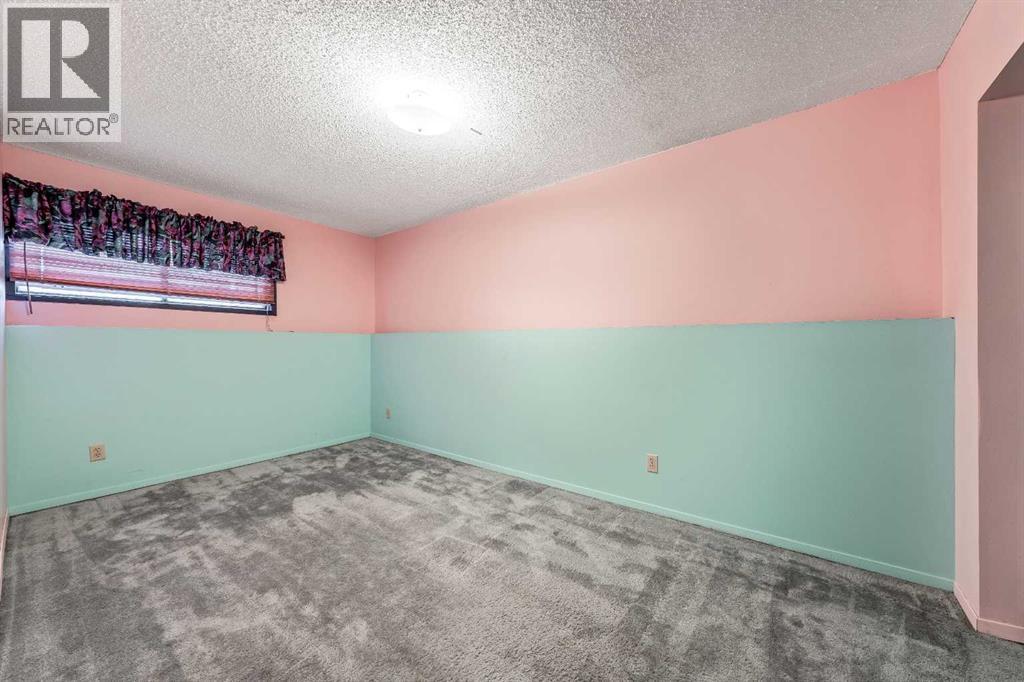 24 Templeson Road Ne, Calgary, Alberta  T1Y 5L6 - Photo 18 - A2270076