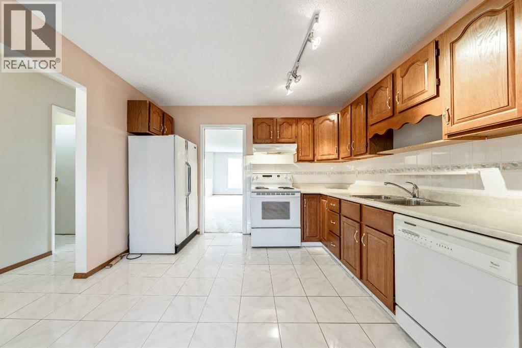 24 Templeson Road Ne, Calgary, Alberta  T1Y 5L6 - Photo 6 - A2270076