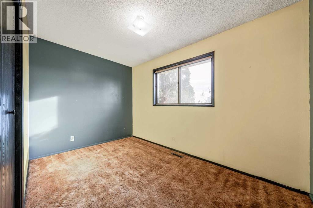 24 Templeson Road Ne, Calgary, Alberta  T1Y 5L6 - Photo 11 - A2270076