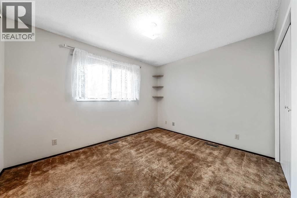 24 Templeson Road Ne, Calgary, Alberta  T1Y 5L6 - Photo 8 - A2270076