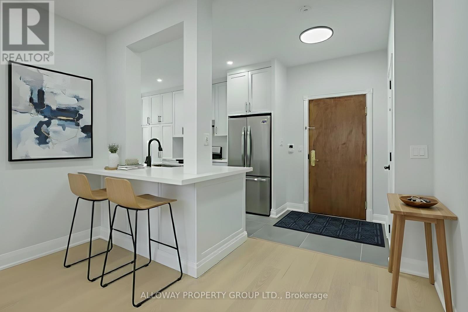 103 - 130 Pond Drive, Markham, Ontario  L3T 7W5 - Photo 6 - N12469305