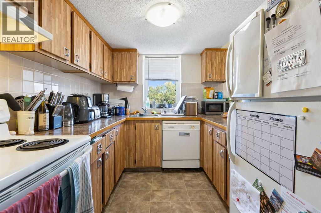 209, 2200 Woodview Drive Sw, Calgary, Alberta  T2W 3N6 - Photo 11 - A2267599