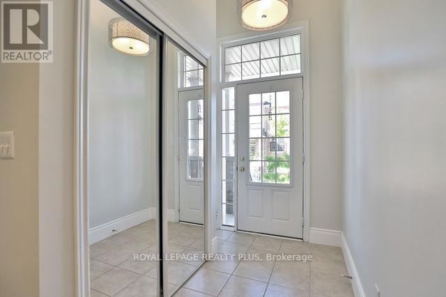 57 - 2179 Fiddlers Way, Oakville, Ontario  L6M 0L6 - Photo 3 - W12579112