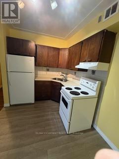 208 - 10 Woodman Drive S, Hamilton, Ontario  L8K 4E1 - Photo 9 - X12579036