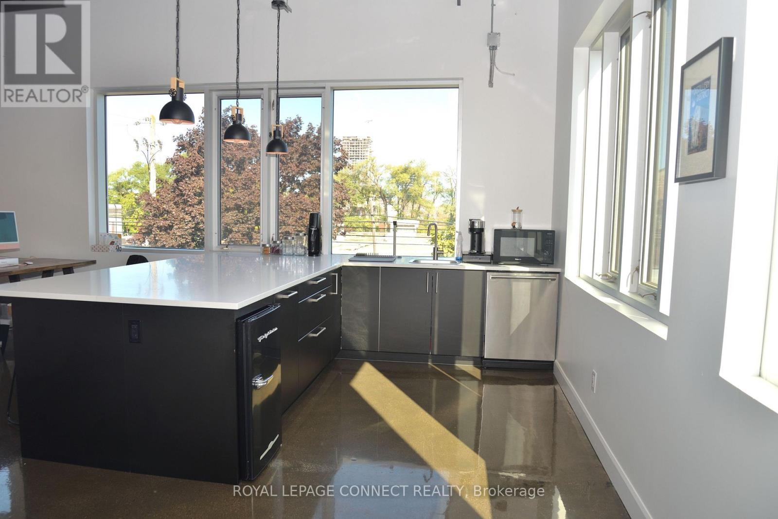 208 - 41 Industrial Street, Toronto, Ontario  M4G 2H5 - Photo 5 - C12579228