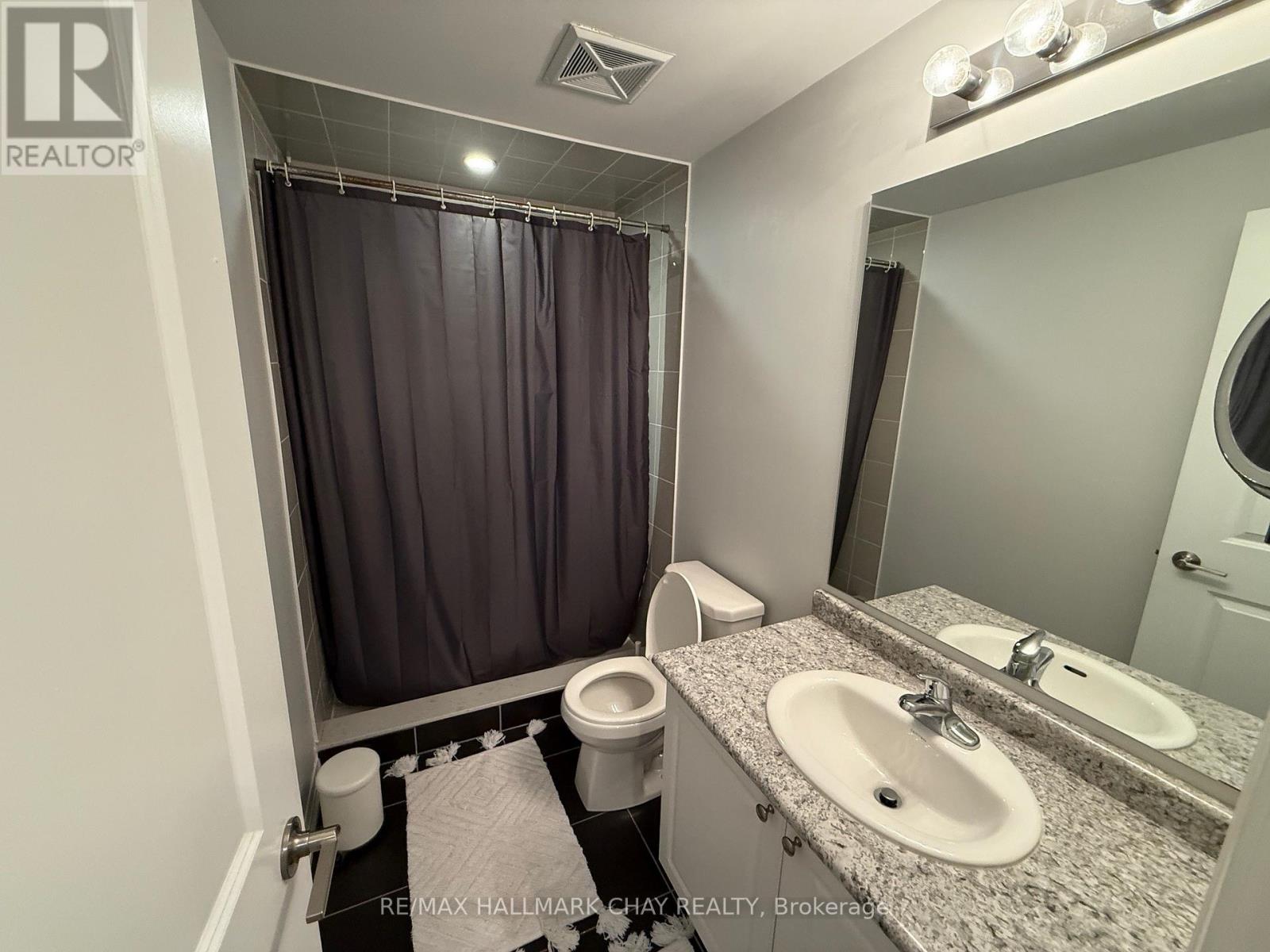 203 - 157 Wellington Street E, New Tecumseth, Ontario  L9R 0R7 - Photo 11 - N12579480