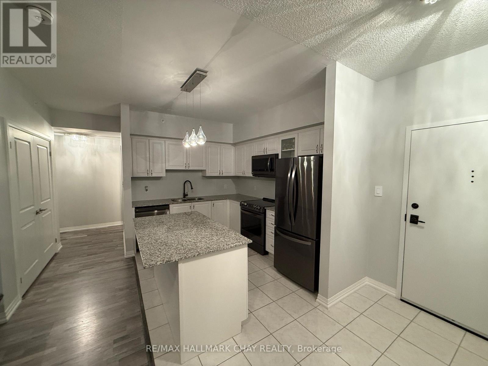 203 - 157 Wellington Street E, New Tecumseth, Ontario  L9R 0R7 - Photo 5 - N12579480