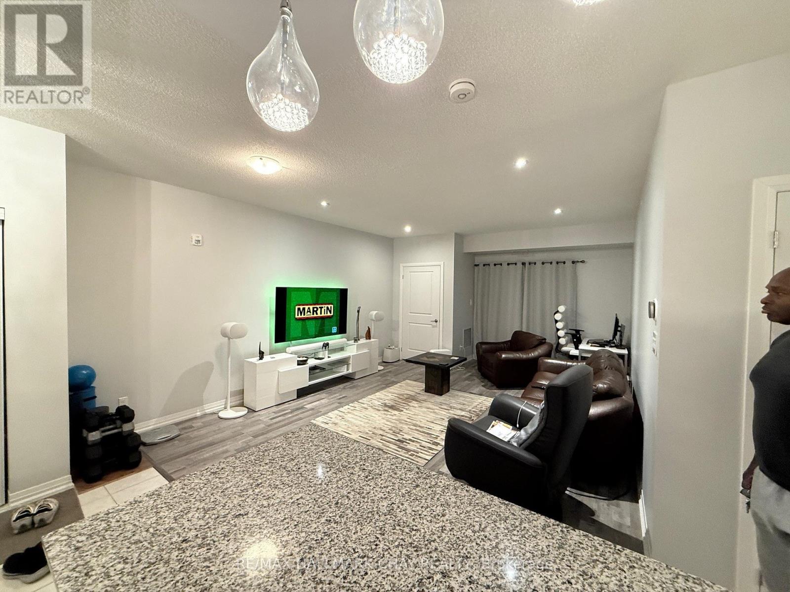 203 - 157 Wellington Street E, New Tecumseth, Ontario  L9R 0R7 - Photo 6 - N12579480