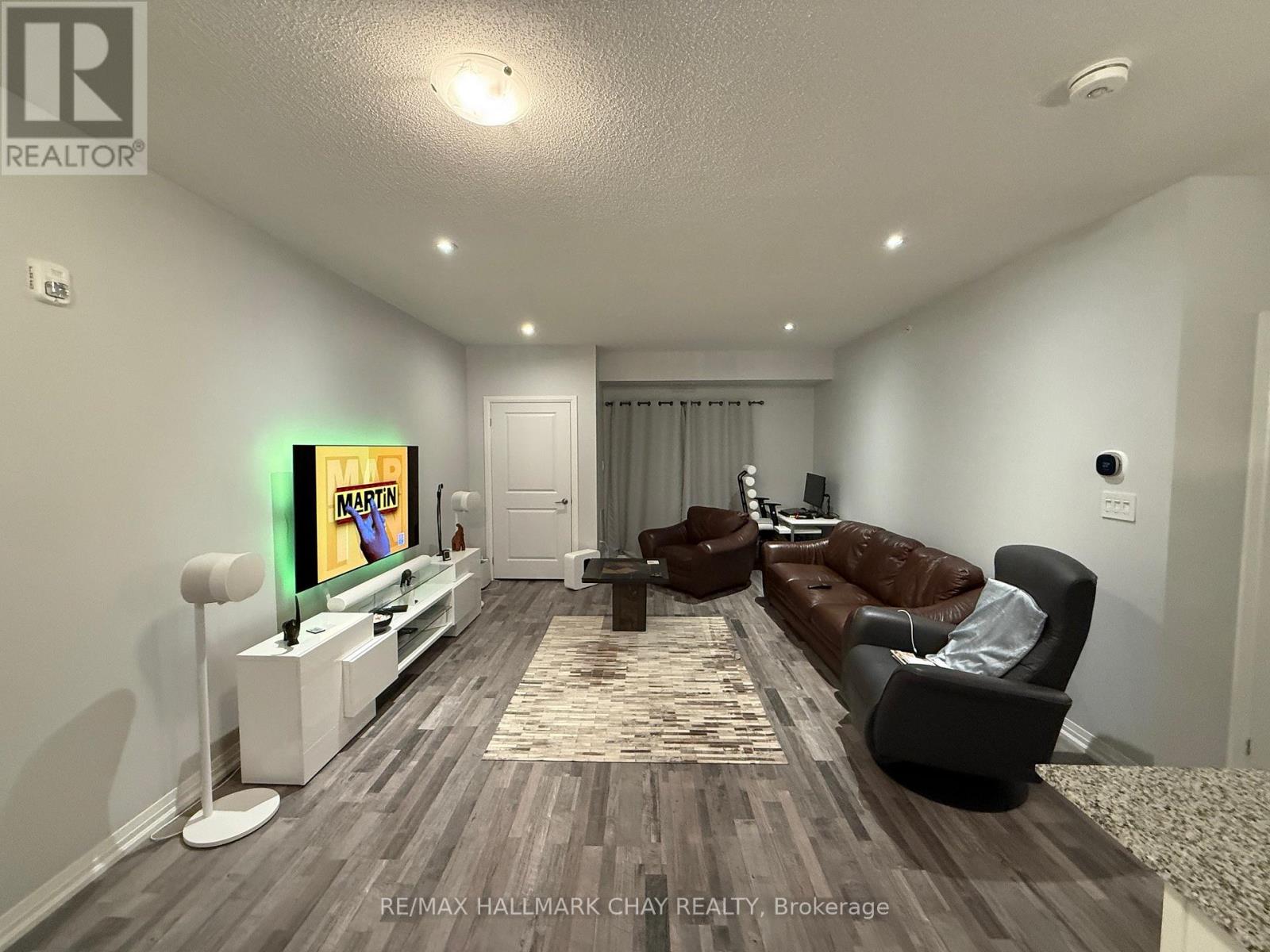 203 - 157 Wellington Street E, New Tecumseth, Ontario  L9R 0R7 - Photo 7 - N12579480