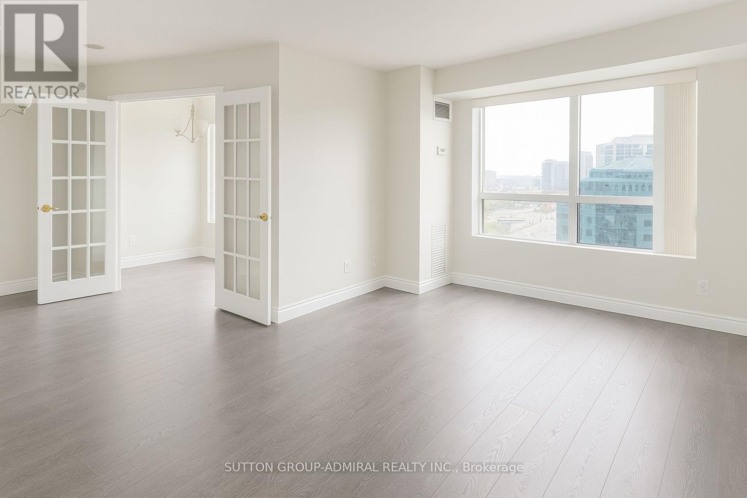 1525 - 25 Kingsbridge Garden Circle, Mississauga, Ontario  L5R 4B1 - Photo 3 - W12579464