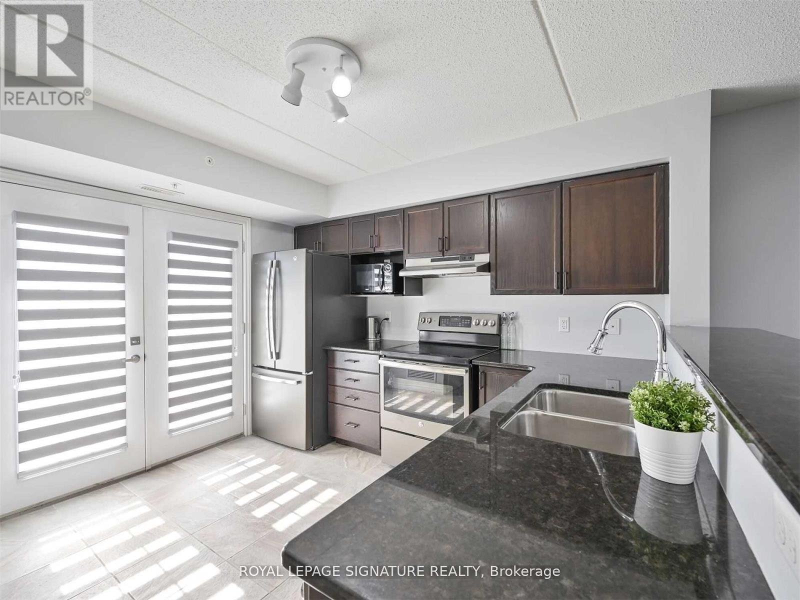 309 - 1450 Main Street E, Milton, Ontario  L9T 8W4 - Photo 10 - W12579514