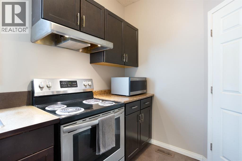 139 Windwood Grove Sw, Airdrie, Alberta  T4B 3S8 - Photo 6 - A2248292