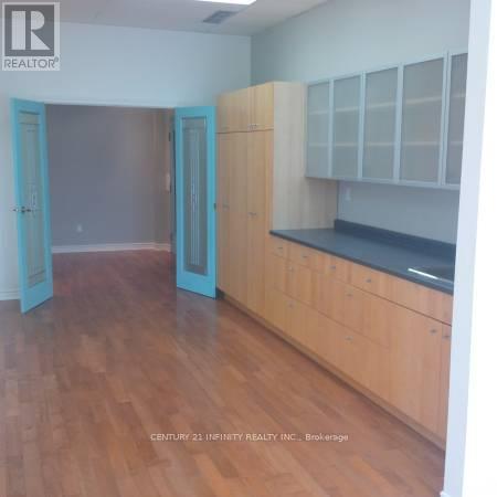 200 - 323 Kerr Street, Oakville, Ontario  L6K 3B6 - Photo 2 - W12579946