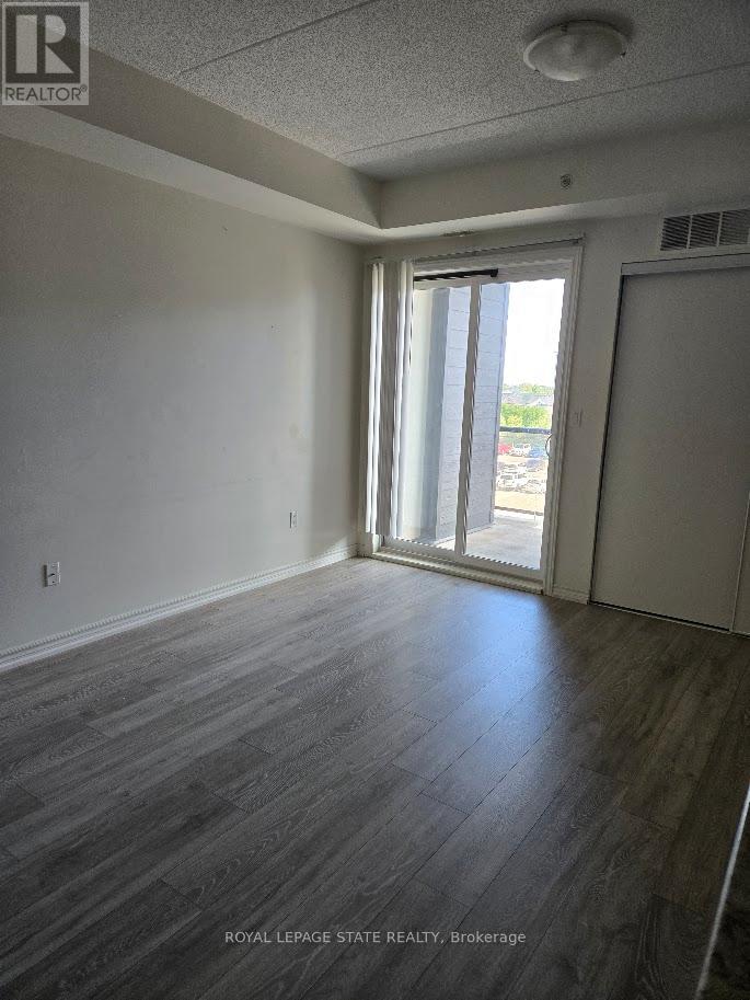 404 - 650 Sauve Street, Milton, Ontario L9T 9A8 - Photo 11 - W12579818