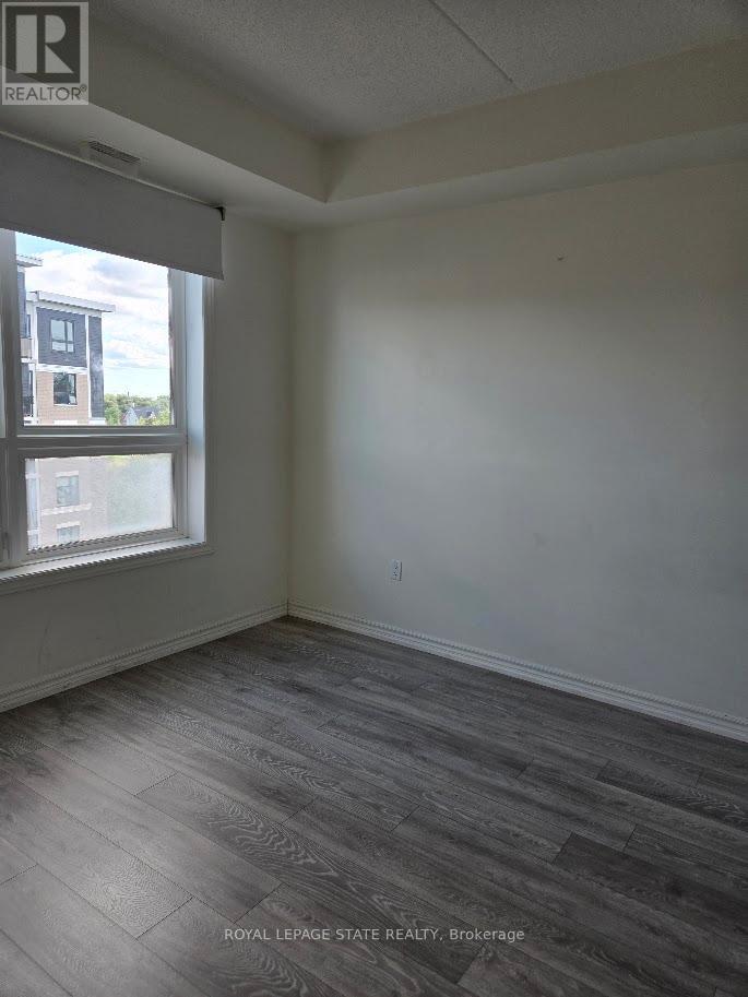 404 - 650 Sauve Street, Milton, Ontario L9T 9A8 - Photo 13 - W12579818