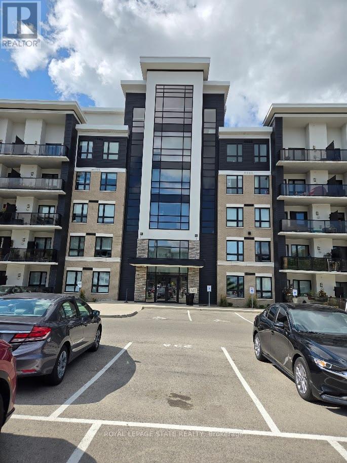 404 - 650 Sauve Street, Milton, Ontario L9T 9A8 - Photo 2 - W12579818