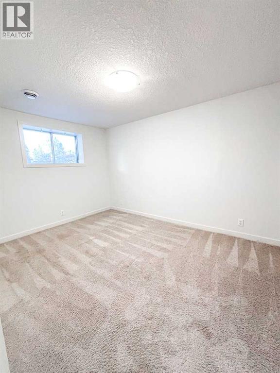 12 Oakbury Place Sw, Calgary, Alberta  T2V 4A2 - Photo 21 - A2250378