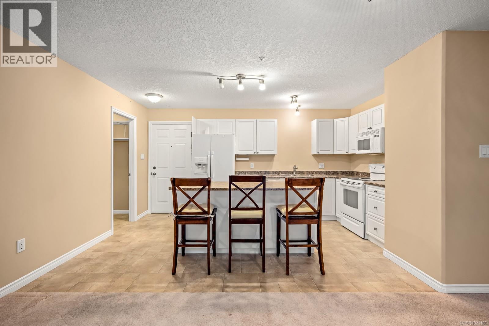 201 129 Back Rd, Courtenay, British Columbia V9N 3W5 - Photo 13 - 1021188