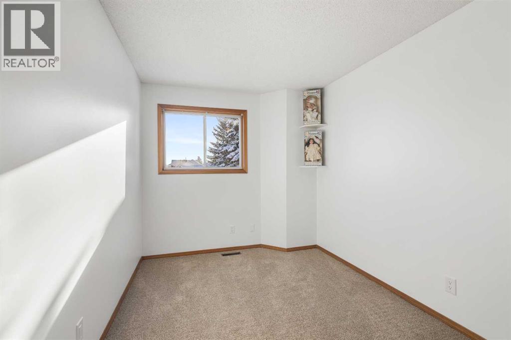 70 Pasadena Gardens Ne, Calgary, Alberta  T1Y 6M8 - Photo 18 - A2272851