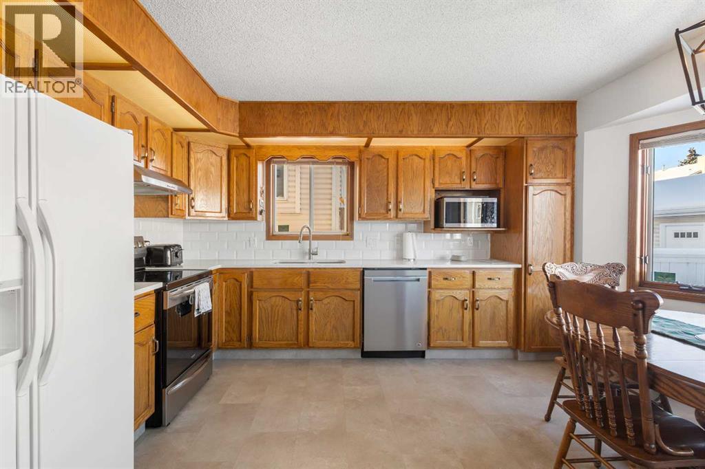 70 Pasadena Gardens Ne, Calgary, Alberta  T1Y 6M8 - Photo 7 - A2272851