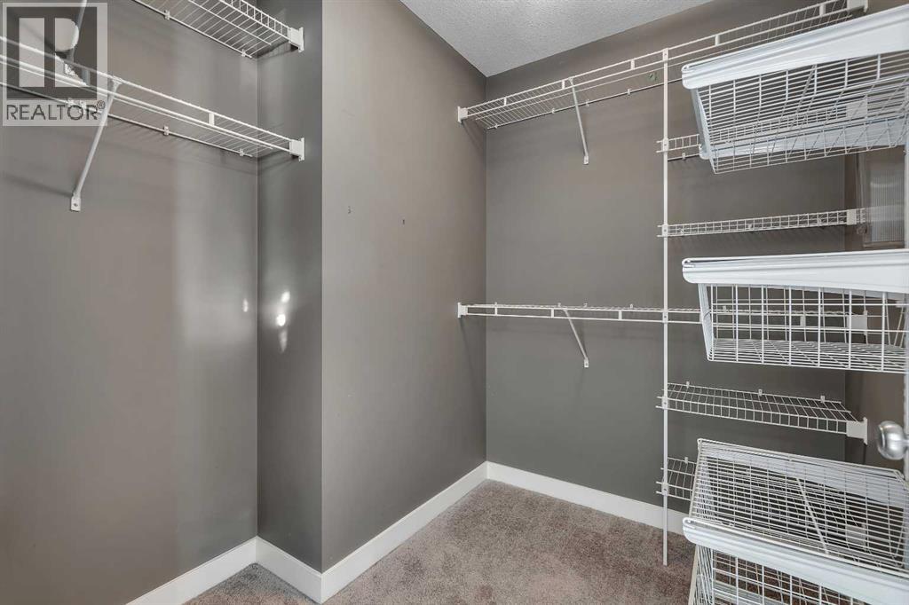 19 West Coach Manor Sw, Calgary, Alberta  T3H 1R7 - Photo 40 - A2271897