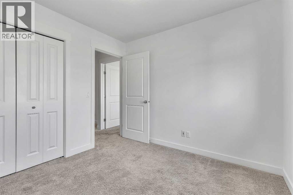 19 West Coach Manor Sw, Calgary, Alberta  T3H 1R7 - Photo 25 - A2271897