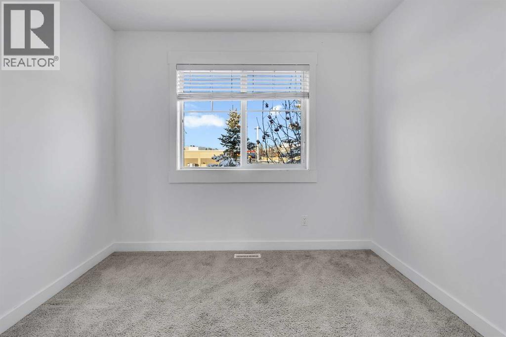 19 West Coach Manor Sw, Calgary, Alberta  T3H 1R7 - Photo 24 - A2271897