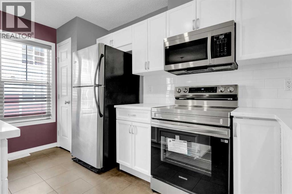 3194 New Brighton Gardens Se, Calgary, Alberta  T2Z 0Y1 - Photo 9 - A2259922