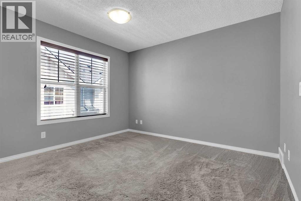 3194 New Brighton Gardens Se, Calgary, Alberta  T2Z 0Y1 - Photo 22 - A2259922