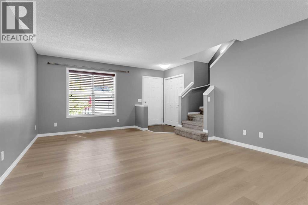 3194 New Brighton Gardens Se, Calgary, Alberta  T2Z 0Y1 - Photo 5 - A2259922