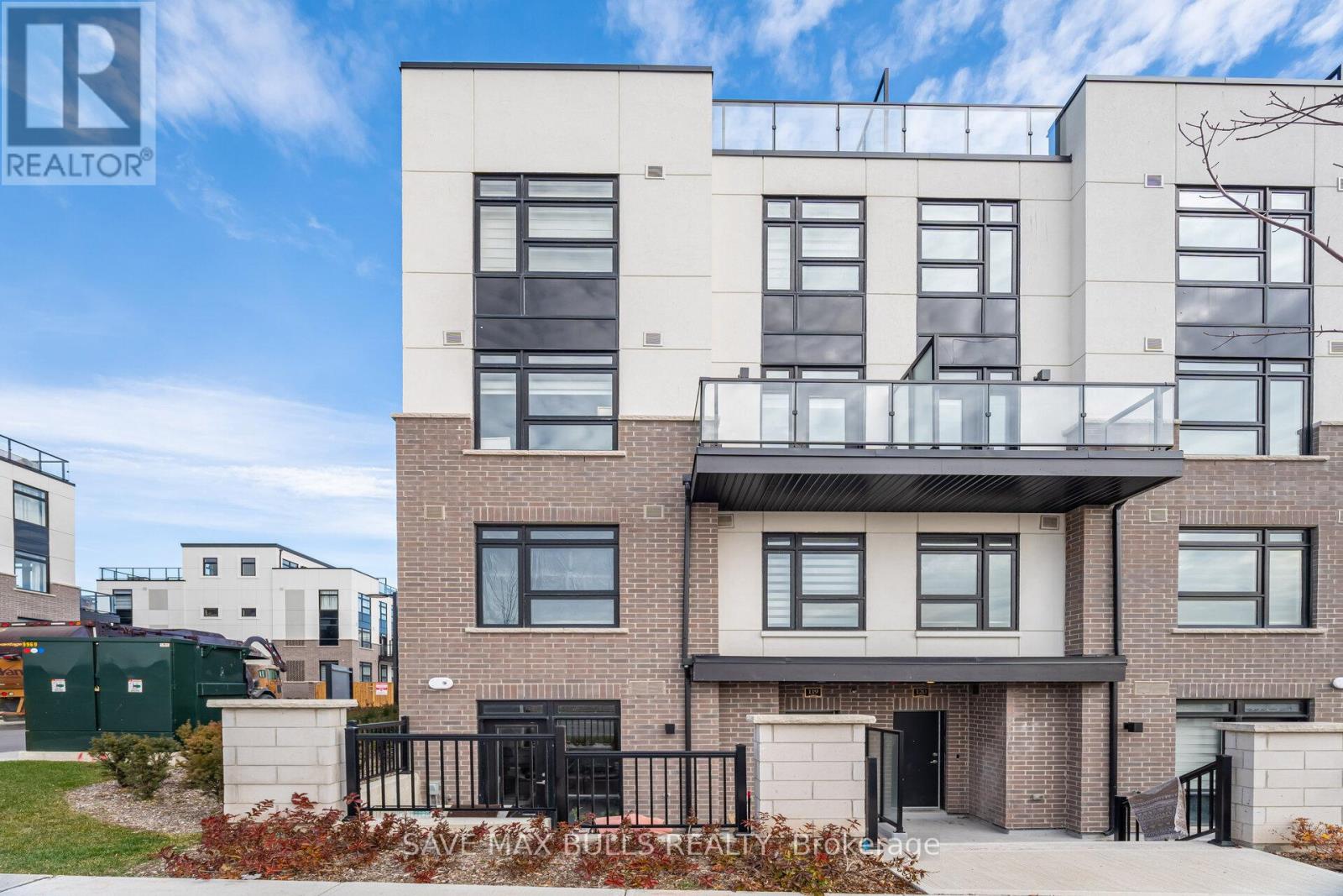 119 - 1589 Rose Way, Milton, Ontario  L9E 1N4 - Photo 2 - W12564220