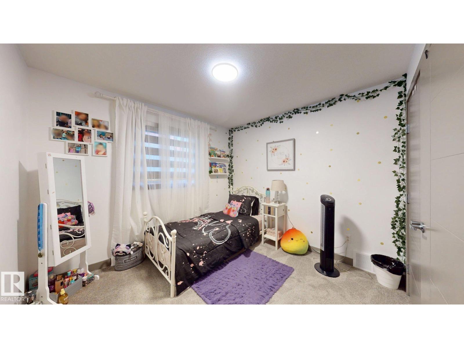 8031 Evans Cr Nw, Edmonton, Alberta  T6M 0T7 - Photo 24 - E4466819