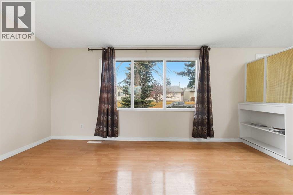 6316 Travois Crescent Nw, Calgary, Alberta  T2K 3S7 - Photo 3 - A2272367