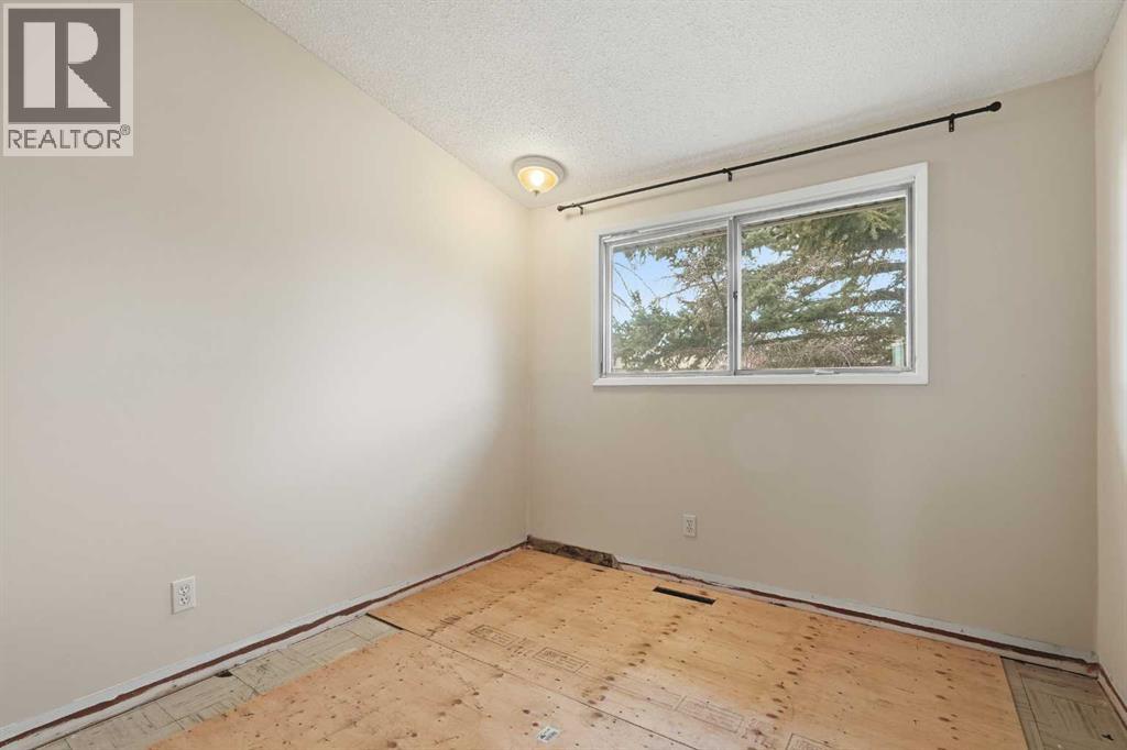 6316 Travois Crescent Nw, Calgary, Alberta  T2K 3S7 - Photo 8 - A2272367