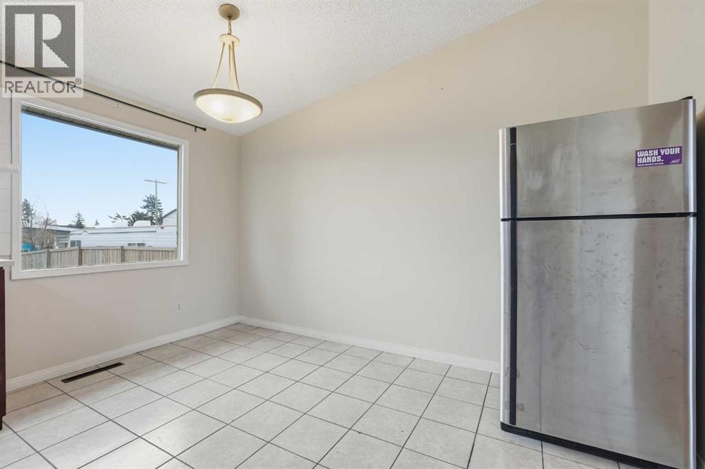 6316 Travois Crescent Nw, Calgary, Alberta  T2K 3S7 - Photo 7 - A2272367