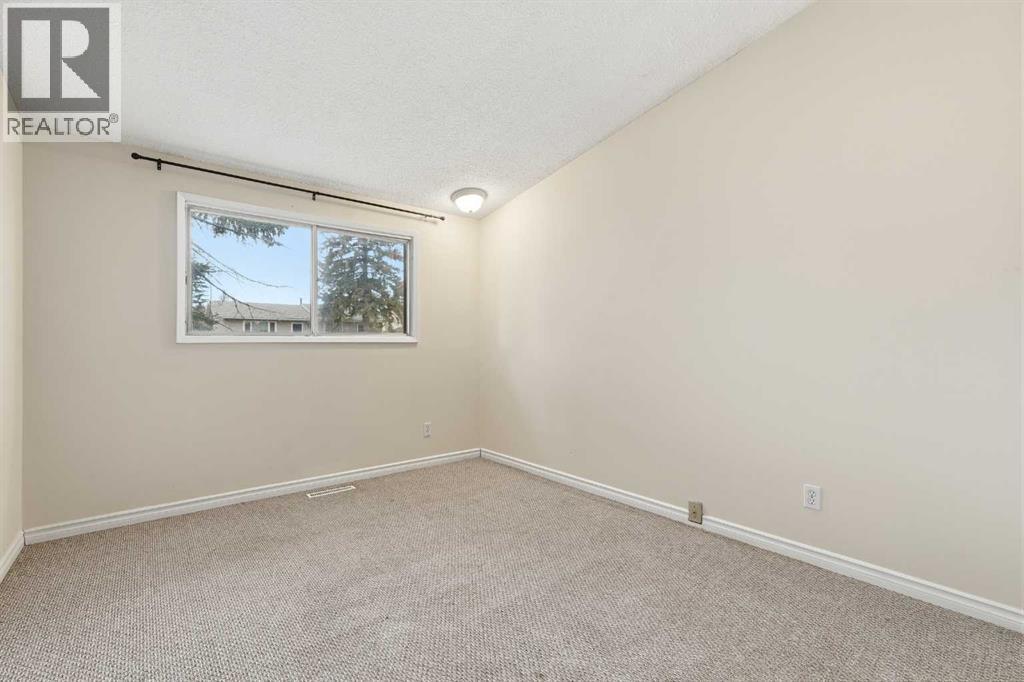 6316 Travois Crescent Nw, Calgary, Alberta  T2K 3S7 - Photo 12 - A2272367