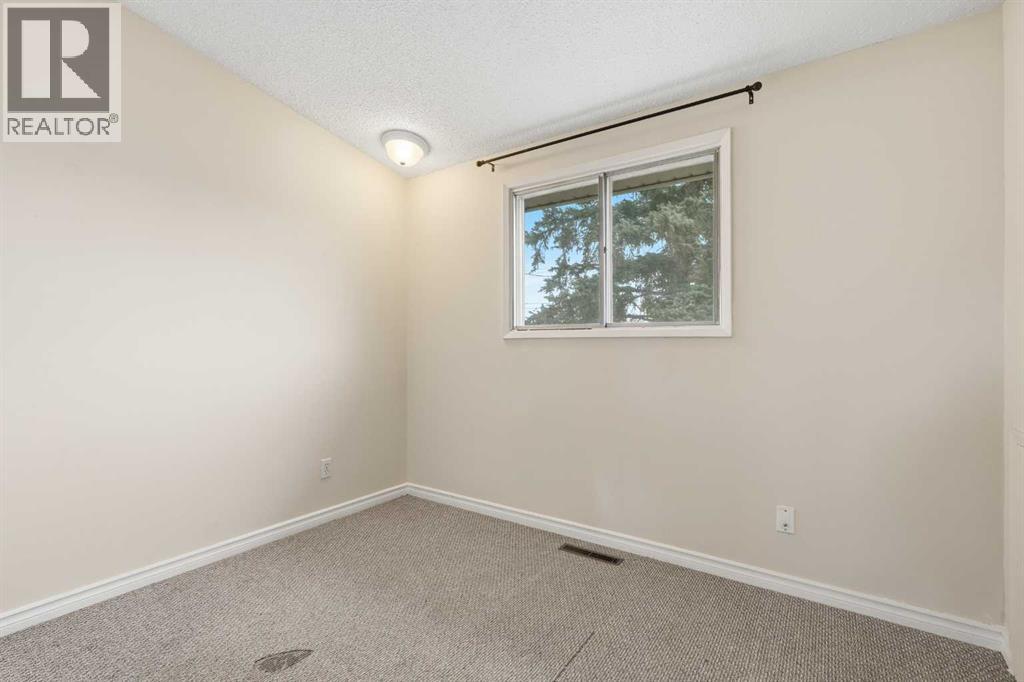 6316 Travois Crescent Nw, Calgary, Alberta  T2K 3S7 - Photo 10 - A2272367