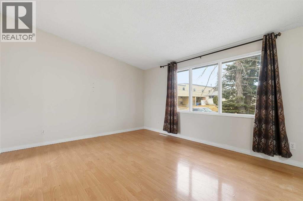 6316 Travois Crescent Nw, Calgary, Alberta  T2K 3S7 - Photo 4 - A2272367